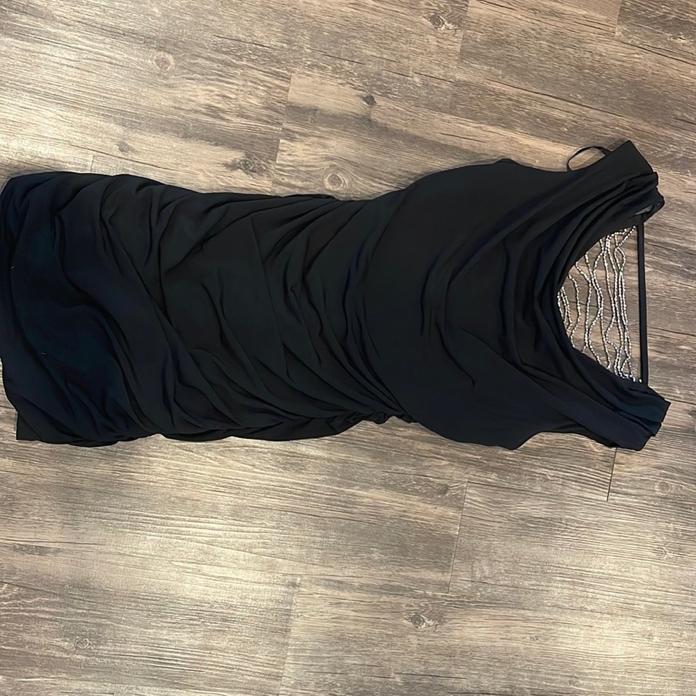 Scrunched black slinky dress.
